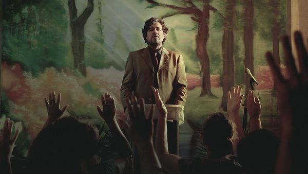 Постер сериала «Чертов святой»